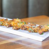 Garlic Parmesan Wings · Mary's natural chicken wings tossed in garlic, parsley and Parmesan.