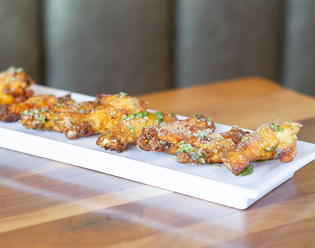 Garlic Parmesan Wings · Mary's natural chicken wings tossed in garlic, parsley and Parmesan.