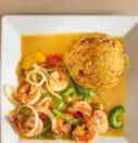 Mofongo de Camarones · Fried mashed green plantains mixed with fried pork skins, garlic, olive oil. butter and shri...