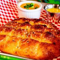 Pretzel Bread · Hot Persian style pretzel bread with spicy brown mustard or beer cheese made with 