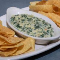 Spinach Dip with Tortilla Chips · Creamy dip made from spinach.