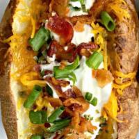 Loaded Potato · Baked potatoes stuffed with a variety of toppings. 