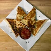 Chicken quesadilla · Chicken and cheese quesadilla served with marinara sauce and fries