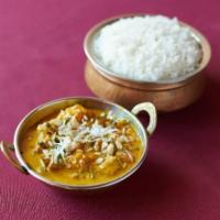 Vegetable Korma · (Mixed vegetables cooked with cream, coconut, Nuts and raisins)