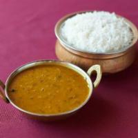 Dal Makhani · Mixed Black lentils cooked with cream and spices