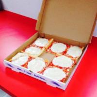 Box of 8 Extra Cheese Provolone · Box of 8 slices of pizza with a slice of provolone cheese on each slice.