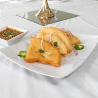 Channa Pathora · Make soft or crispy pories and serve along with chana masala.