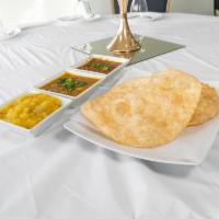 Halwa Puri · A traditional breakfast that features halwa and soft fried dough called puri.