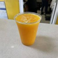Orange Juice - Medium · 100% natural Orange juice served on a 16oz glass
