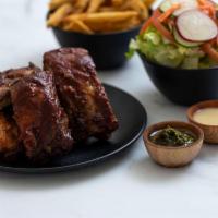 Baby Ribs · Served with french fries and salad.