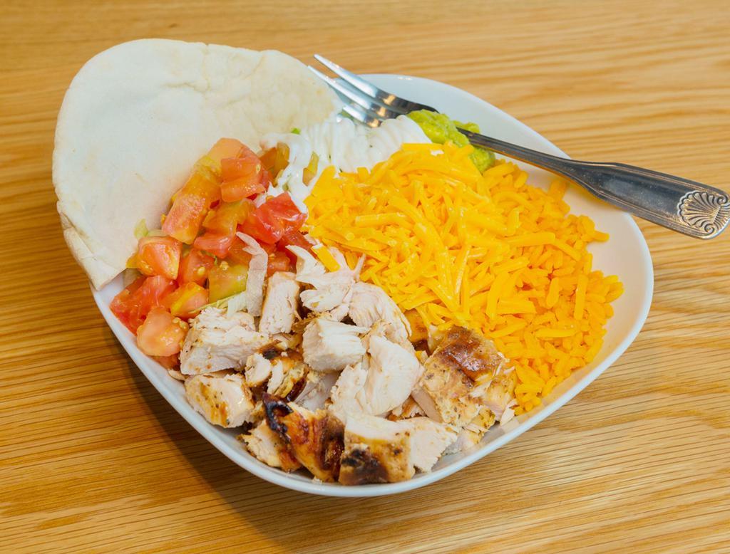 South Border Chop · Chopped grilled chicken breast, served on rice, with lettuce, tomatoes, sour cream, guacamole, cheese, and pita.