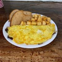 Omelet · White onion, mushroom and cheese served with potato and toast.