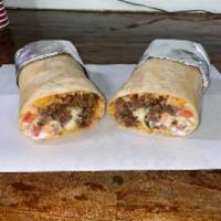 Asada Burrito  · Diced beef, rice, beans, pico de gallo, guacamole and sour cream.