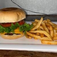 Cheeseburger · Beef Pattie Amercican Cheese tomato pickles onion and lettuce with a side of fries