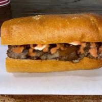 1. Tri-Tip Lunch · Caramelized onion, Monterey Jack, BBQ sauce house sauce, mayo and Dutch crust roll.