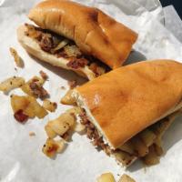 Philly Cheese Steak  · Tender steak served with grilled onions and melted provolone cheese
