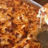 Mac & Cheese Pizza · Our Delicious Mac & Cheese, Mozzarella, and Cheddar on our Cream Cheese Base. Try it by topp...