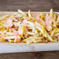 Monkey Fries · French fries covered in secret sauce, mustard, onions, and pickles 