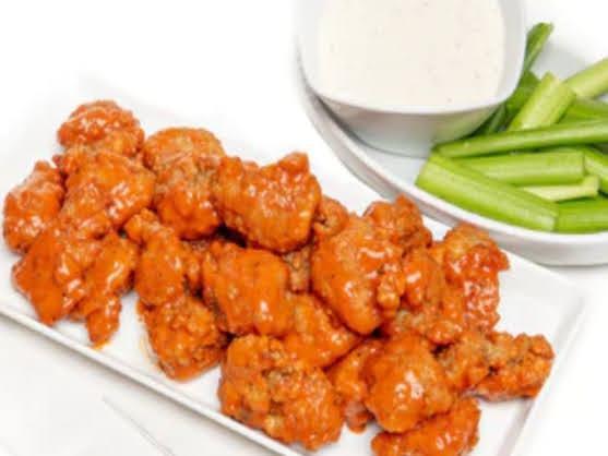 1 Pound Boneless wings · Award winning Halal Boneless wings served with crisp, cool celery sticks and your choice of Bleu Cheese or Ranch
