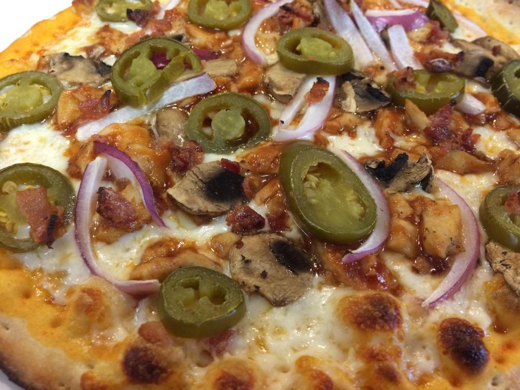 Spicy BBQ Chicken and Bacon · Red hot sauce, mozzarella, BBQ chicken, bacon, mushrooms, red onions and jalapenos.