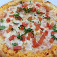 Margherita Pizza · Red sauce, mozzarella, tomatoes, garlic and basil.