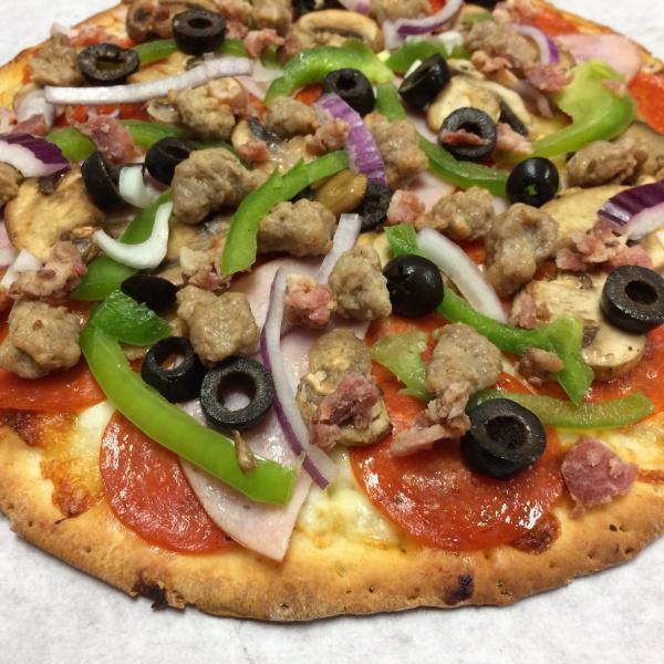 Combination Pizza · Red sauce, mozzarella, pepperoni, sausage, mushrooms, black olives, bell peppers, red onions and bacon. 