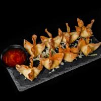 Crab Rangoon · 8 pieces. Crispy fried wonton filled with cream cheese, imitation crab, and spices. Served w...