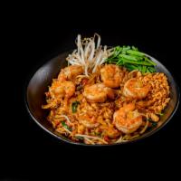 Pad Thai Plate · Stir-fried noodle with egg, bean sprouts, chives, and crushed peanuts on the side. Served wi...