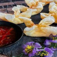 Crab Rangoon Plate · Crispy fried wonton filled with cream cheese, imitation crab, and spices. Served with sweet ...