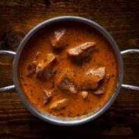 Lamb Tikka Masala · Baked lamb cubes cooked with tomatoes and coconut cream sauce.