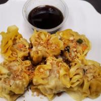Steamed Dumpling (5pcs)  · Ground pork, bamboo and dried black mushroom steamed dumpling topped with fried garlic.  Ser...
