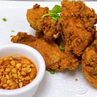 Chicken Wings (6pcs) · Tempura fried chicken wings served with a sweet home-made dipping sauce.