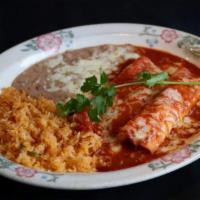 Mole Enchiladas · Two tortillas, filled with your choice of meat topped with sweet “Mole” sauce and Jack chees...