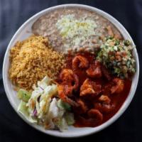 Camarones a la Diabla · Large shrimp sauteed with garlic spices and covered with a spicy red hot sauce served with r...