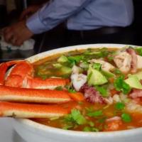 Siete Mares Soup · A delicious Mexican homemade soup made with fish, prawns, crab legs, clams, mussels, and cal...