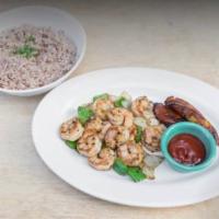 Jerk Shrimp Meal  · Jerk shrimp served with rice and peas