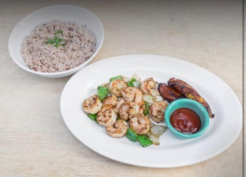 Jerk Shrimp Meal  · Jerk shrimp served with rice and peas