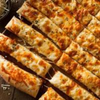 Cheesy Garlic Bread · Made from our homemade dough, with garlic sauce, and Mozz/ Prov cheese