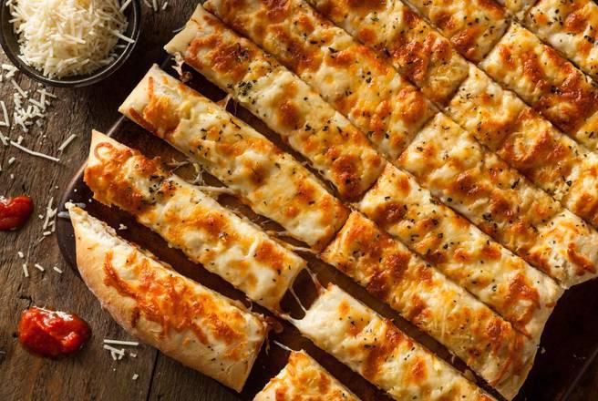 Cheesy Garlic Bread · Made from our homemade dough, with garlic sauce, and Mozz/ Prov cheese