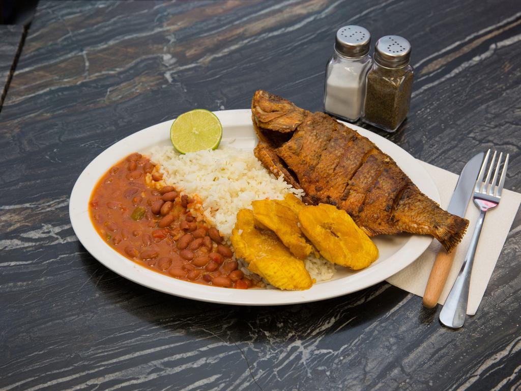 Fried Fish · Served with tostones rice and beans or rice and salad and soda. 