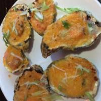 Baked Oysters · With cheese.