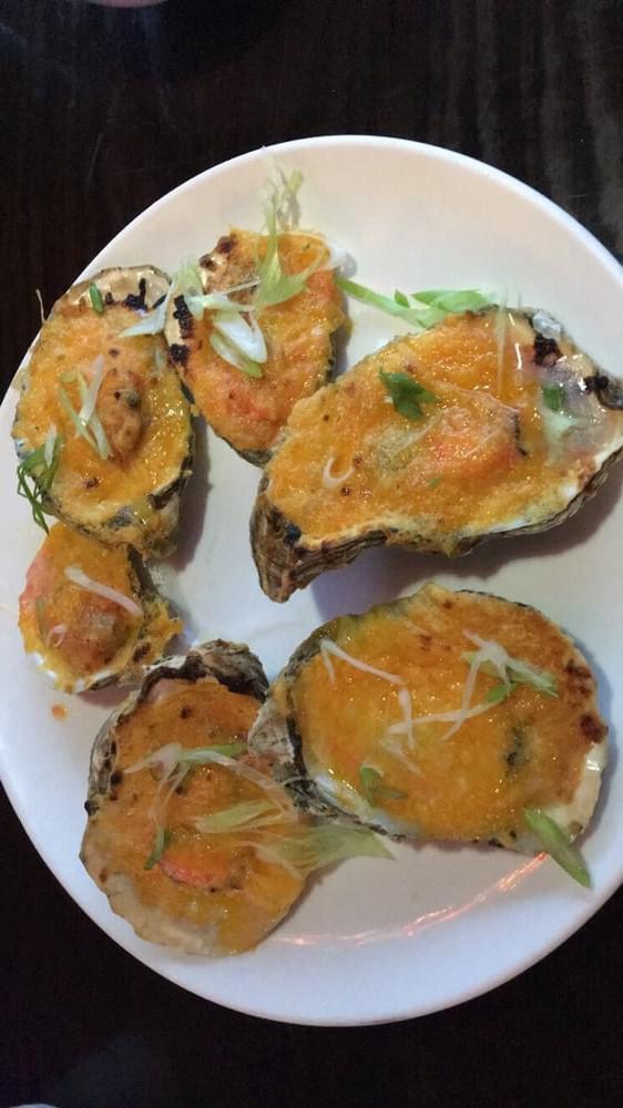 Baked Oysters · With cheese.