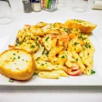 Shrimp Penne Pasta · Penne pasta, mushrooms, red bell peppers, green onions and sauteed jumbo shrimp in Alfredo s...