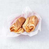 Chicken Cutlet Parmigiana Hero · A long sandwich on a roll. 