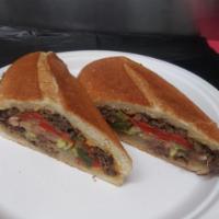 Philly Cheese Steak Sandwich · Served on hero, onions, peppers, lettuce, tomato and your choice of cheese