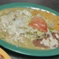 Enchilada Plate · Red or green chile. Served with beans and rice.  Add meat for an additional charge.