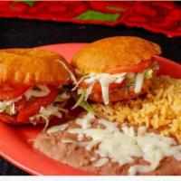 Gorditas Plate · Topped with lettuce, tomato and cheese. Served with beans and rice.