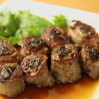Beef Negimaki Appetizer · Sliced beef rolled with scallion. 