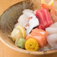 Chirashi · Assorted sliced raw fish over vinegar rice. Served with miso soup. 