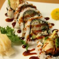 Spider Roll · Five pieces. Deep fried soft shell crab, cucumber and masago.